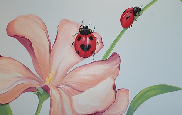 lady bugs on flowers mural